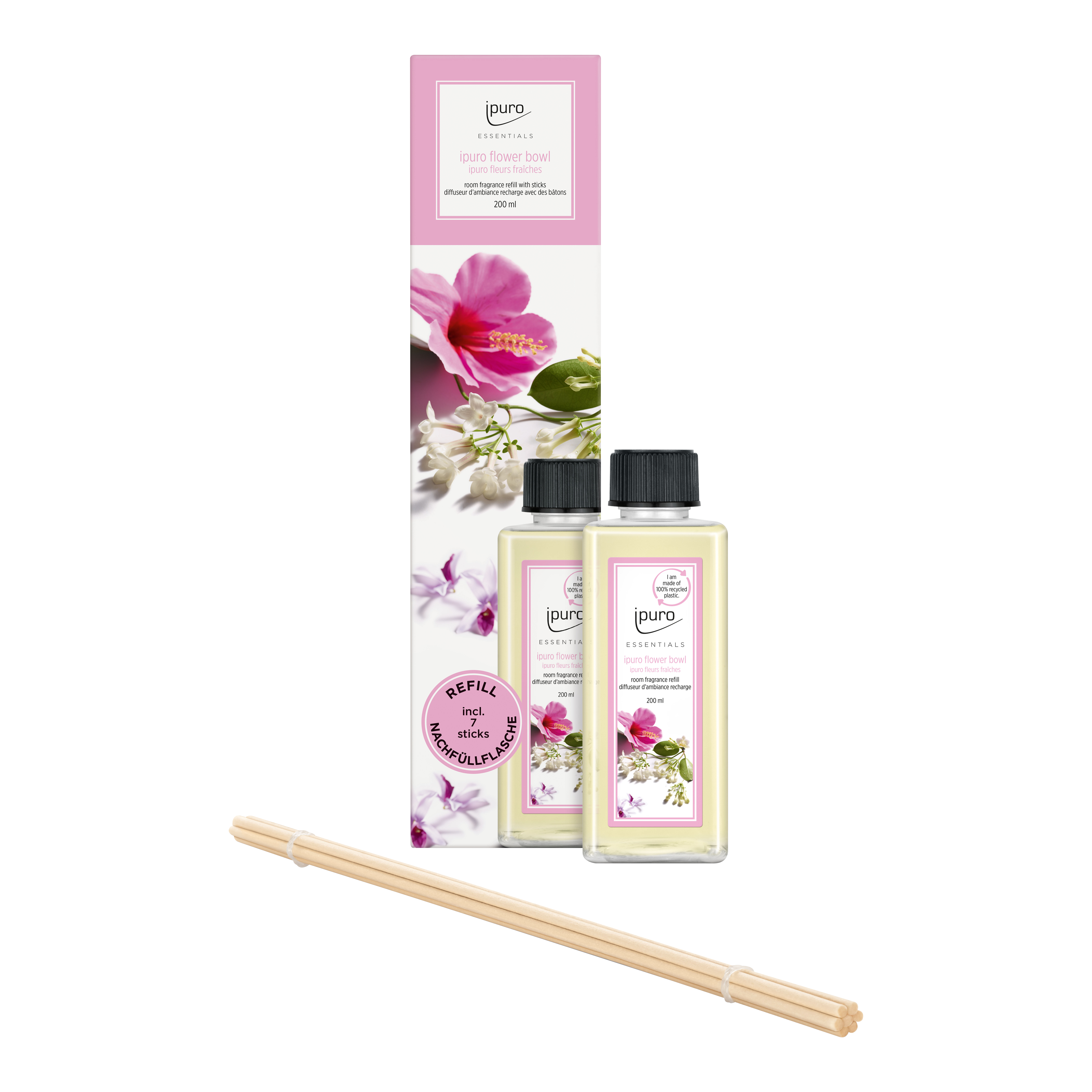 Die ESSENTIALS ipuro Blumenschale Raumduft-Nachfüller von ipuro enthält zwei kleine Nachfüllflaschen mit rosa und weißem Etikett, eine florale Box und natürliche Schilfstäbchen für eine blumige Note.