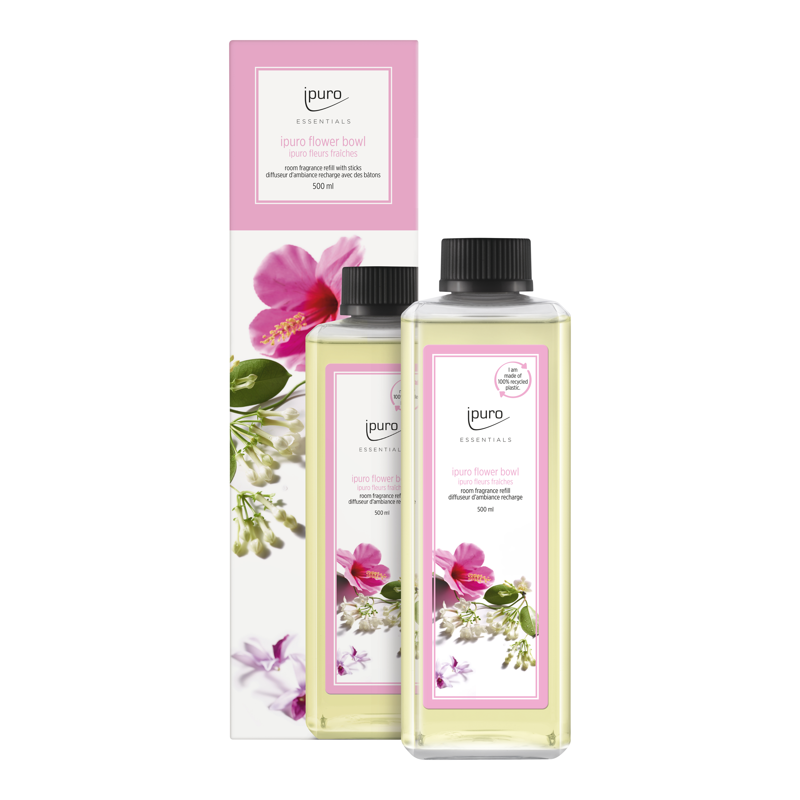 Ein rechteckiger Flakon von ESSENTIALS ipuro flower bowl Raumduft-Nachfüller von ipuro, mit schwarzem Verschluss und rosa Akzenten, steht vor seiner blumengeschmückten Schachtel, die weiße und rosa Blüten für eine blumige Note mit Maiglöckchen-Anklängen zeigt.
