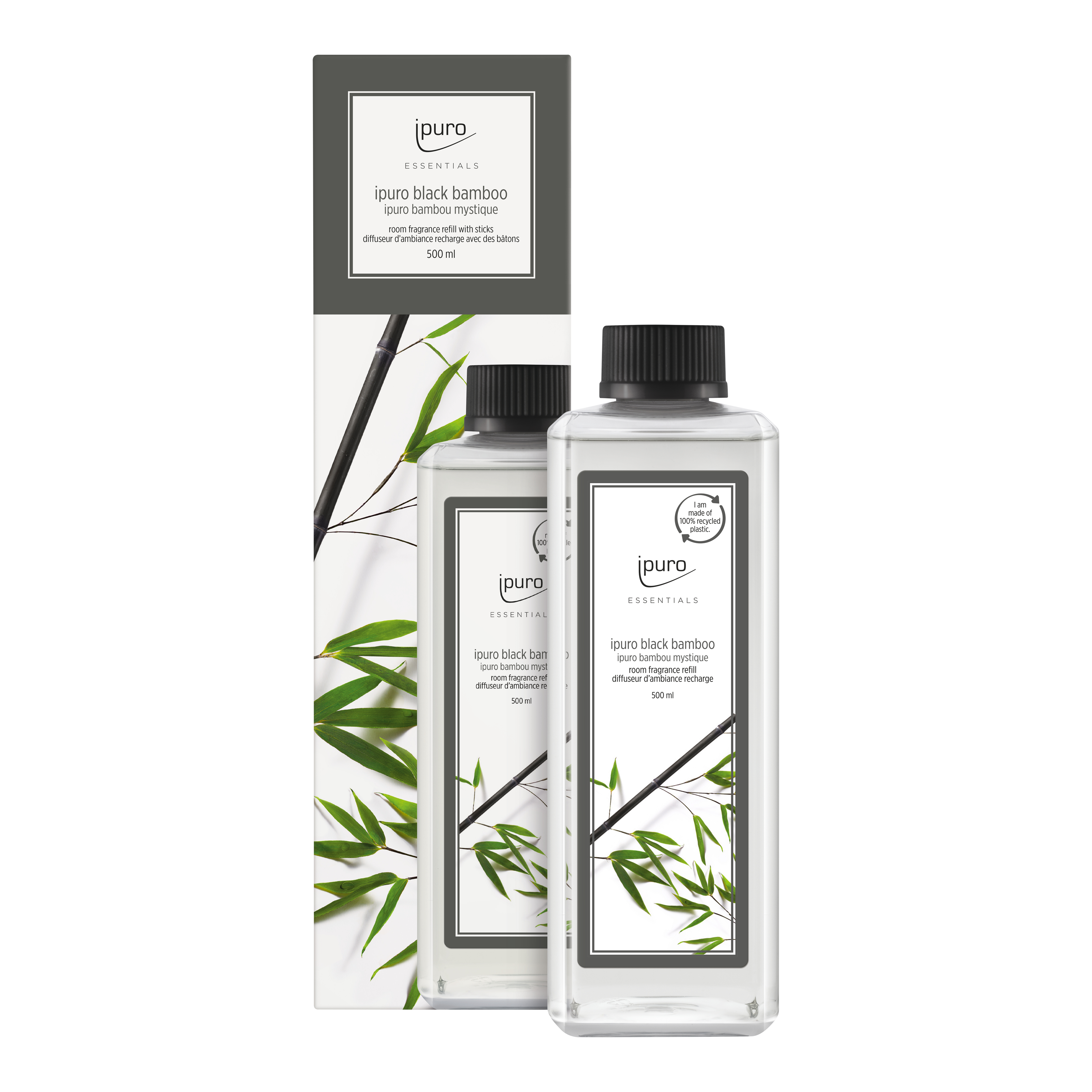 Ein durchsichtiger Flakon mit schwarzer Kappe und dem Etikett "ESSENTIALS ipuro black bamboo Raumduft-Nachfüller" von ipuro steht vor der passenden Schachtel, die mit grünen Bambusblättern und schwarzen Halmen verziert ist, die den frischen Jasmin-Zitronen-Duft widerspiegeln.