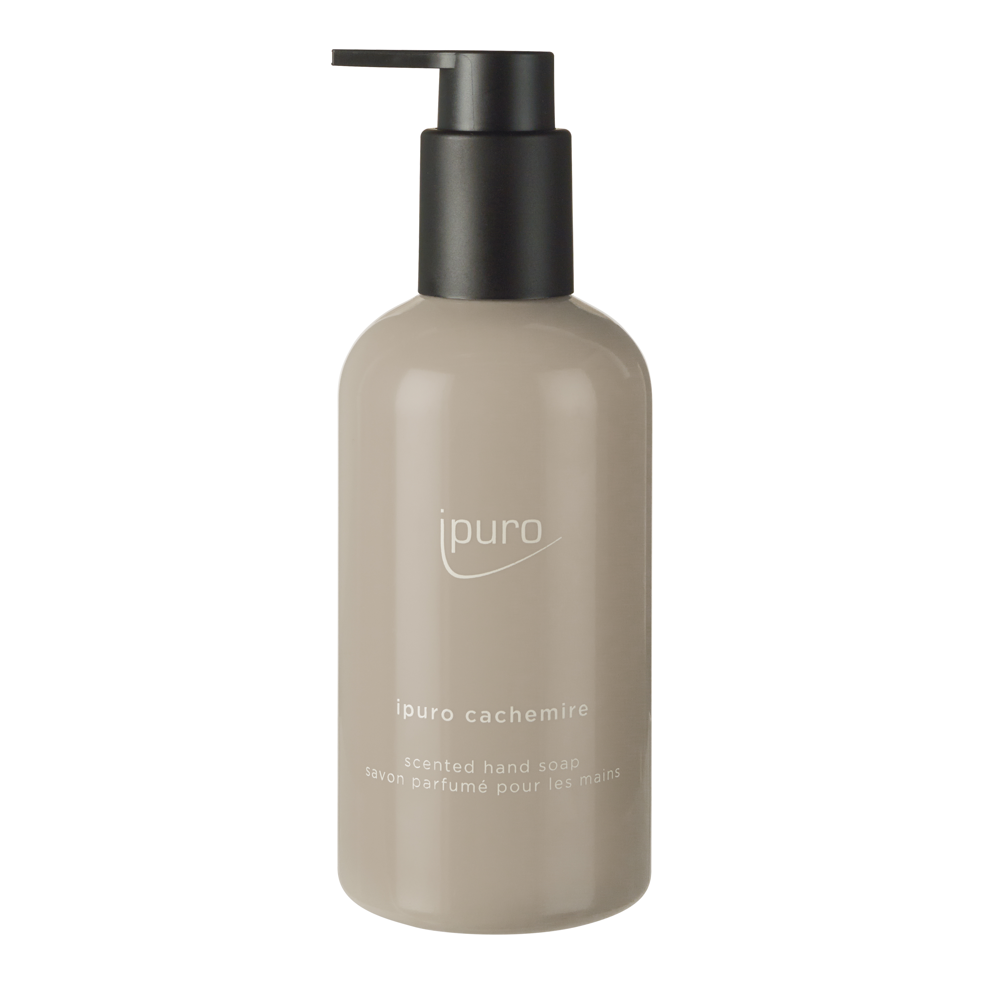 Eine beigefarbene Pumpflasche mit der Aufschrift "ipuro CLASSIC cachemire Handseife" der Marke ipuro enthält duftende Handseife mit Noten von Rose und Zedernholz, mit Text in Englisch und Französisch.