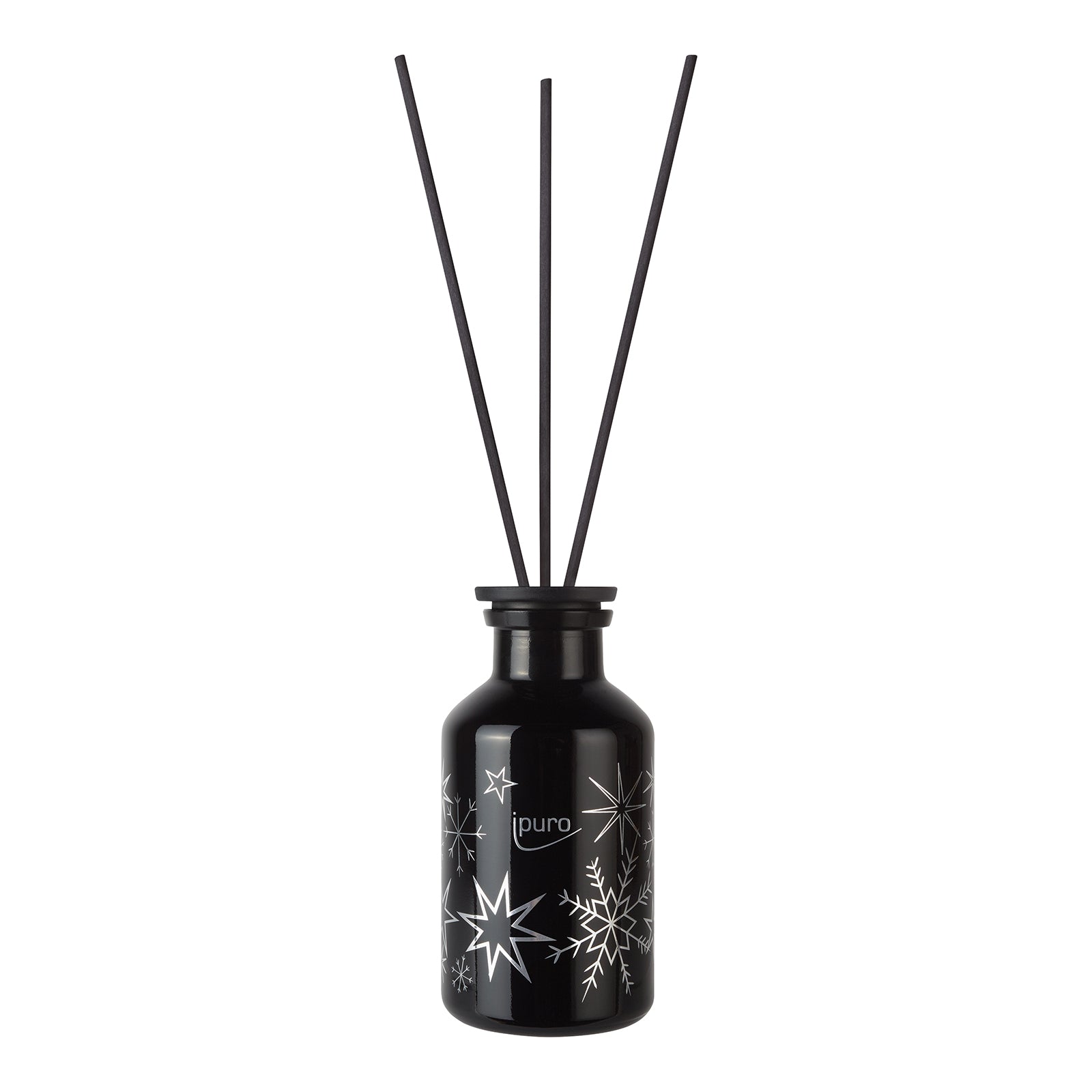 Die LIMITED EDITION ipuro frozen stardust Raumduft besteht aus einer schwarzen Diffusorflasche mit weißem Stern- und Schneeflockenmotiv, drei schwarzen Stäbchen und füllt Ihren Raum mit dem erfrischenden Neuschnee-Duft von ipuro.
