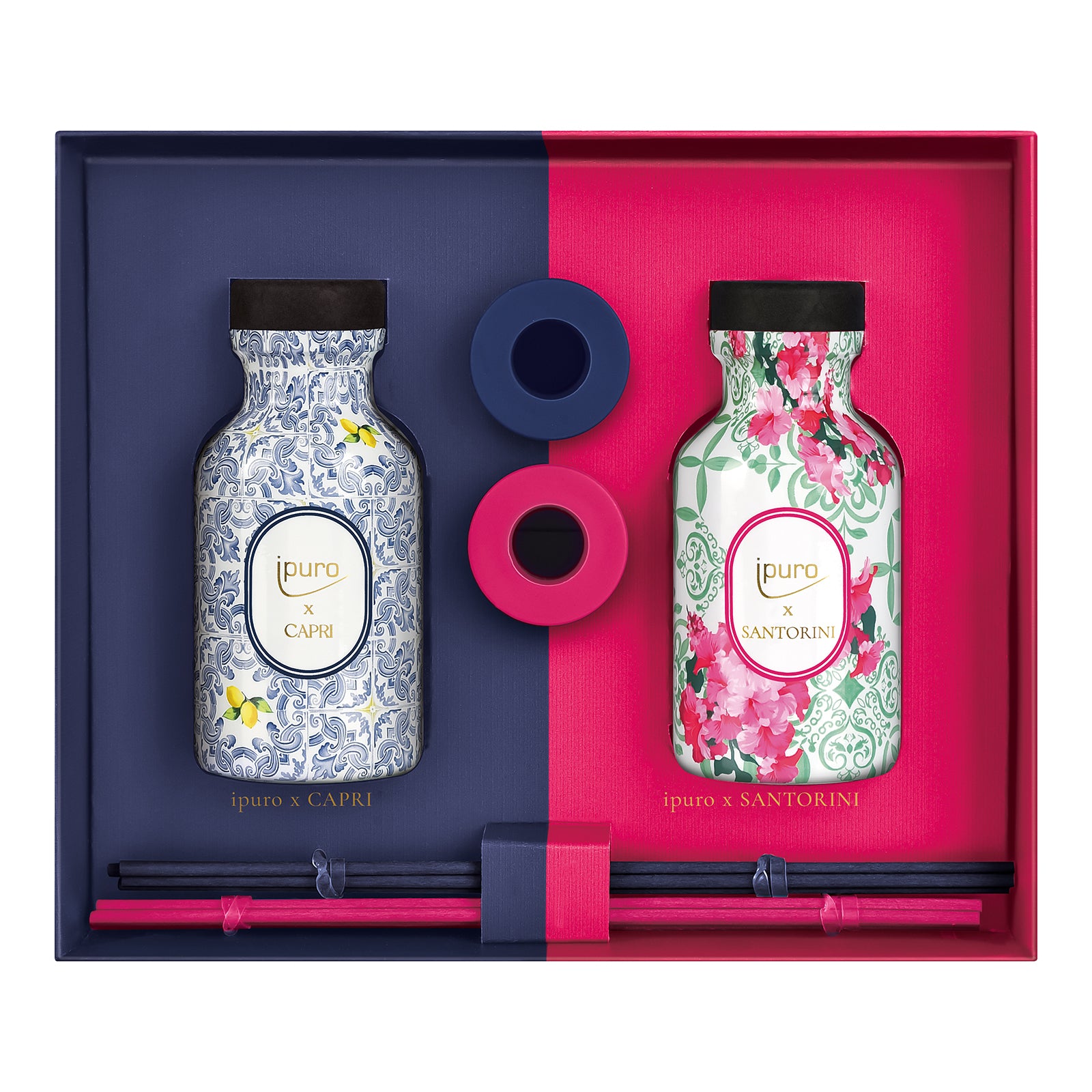 Das LIMITED EDITION ipuro capri & santorini Raumduft-Set von ipuro enthält zwei dekorative Duftflaschen, passende Verschlüsse, Ringe und schwarze Stäbchen - ideal, um einen blumig fruchtigen Sommerduft in Ihren Raum zu bringen.