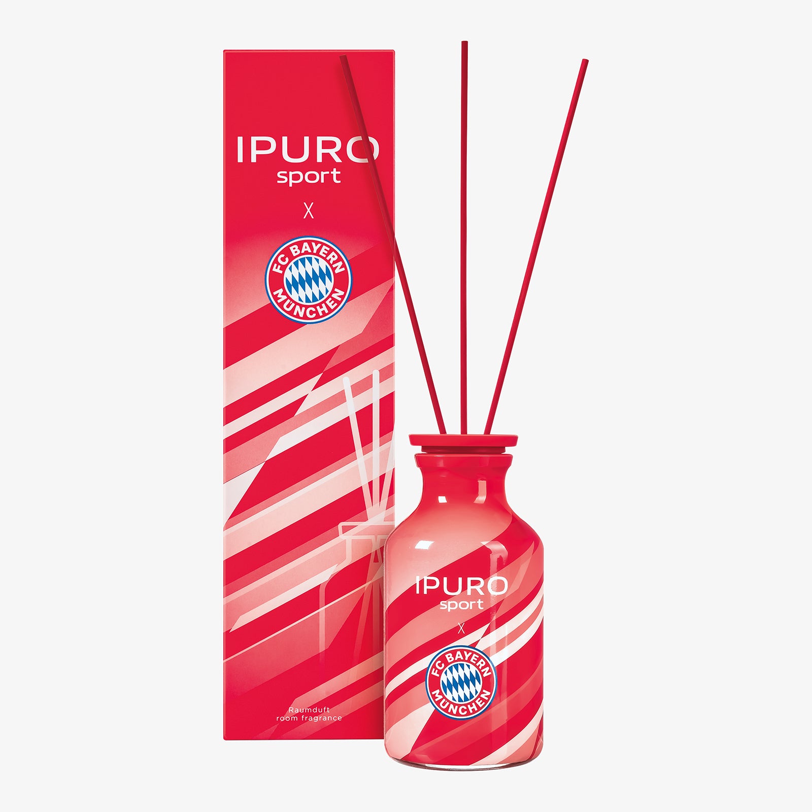 Der ipuro x FC Bayern München Raumduft ist ein roter Diffusor mit drei Stäbchen von ipuro, die ein dynamisches Design in Weiß und Rot sowie das FC Bayern München Duft-Logo auf dem Flakon und der Verpackung aufweisen.