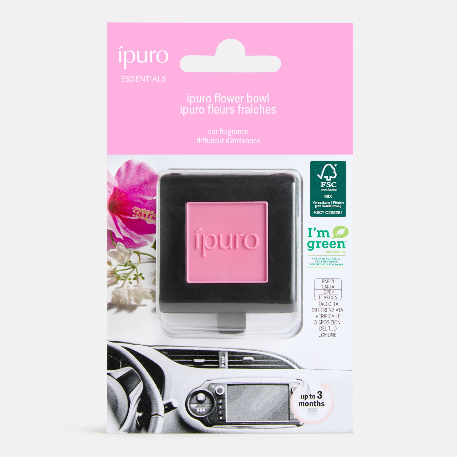 Der ipuro Autoduft Flower Bowl Auto-Duftzerstäuber in Pink zeigt sich in seiner umweltfreundlichen Verpackung mit Blumengrafik, einem Bild des Armaturenbretts, "belebende Frische" und bis zu 3 Monaten Duft von ipuro.