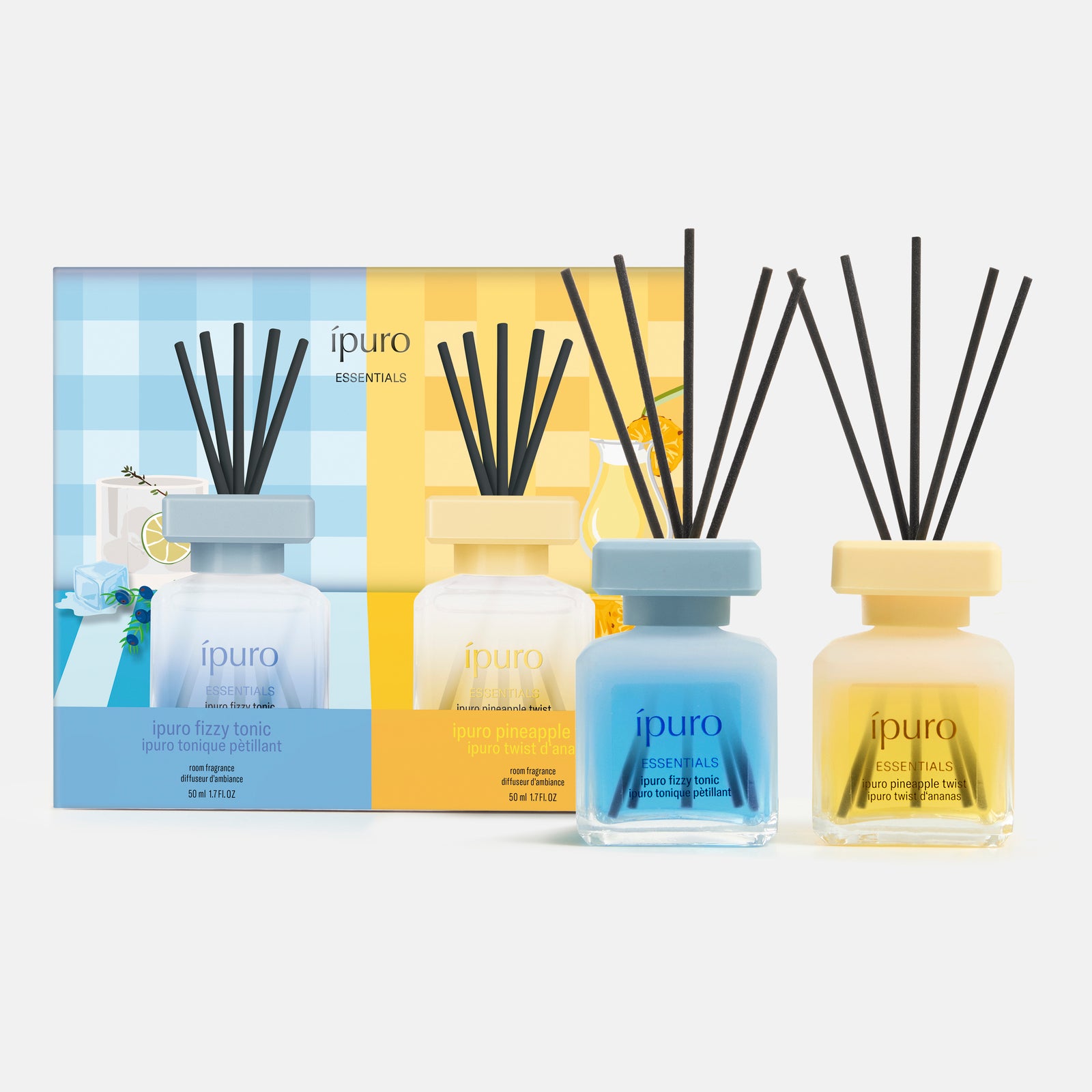 Das ESSENTIALS ipuro Ananas Twist & Fizzy Tonic Geschenk-Set von ipuro besteht aus drei gläsernen Duftzerstäubern mit schwarzem Schilfrohr und bietet tropische Düfte in blauen und gelben Flaschen, die vor der lebhaften, passenden Verpackung präsentiert werden.